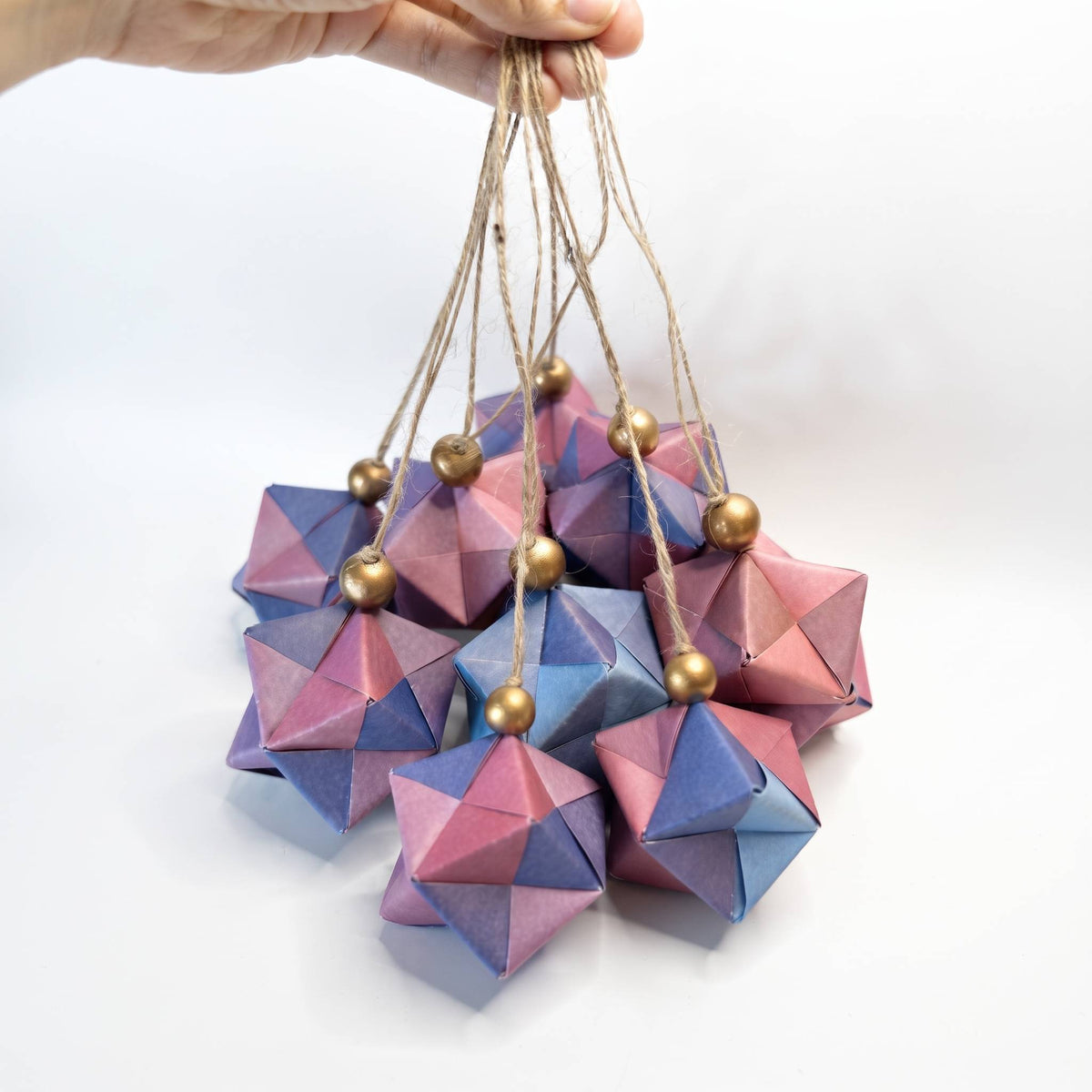 Handmade origami ornaments in pink